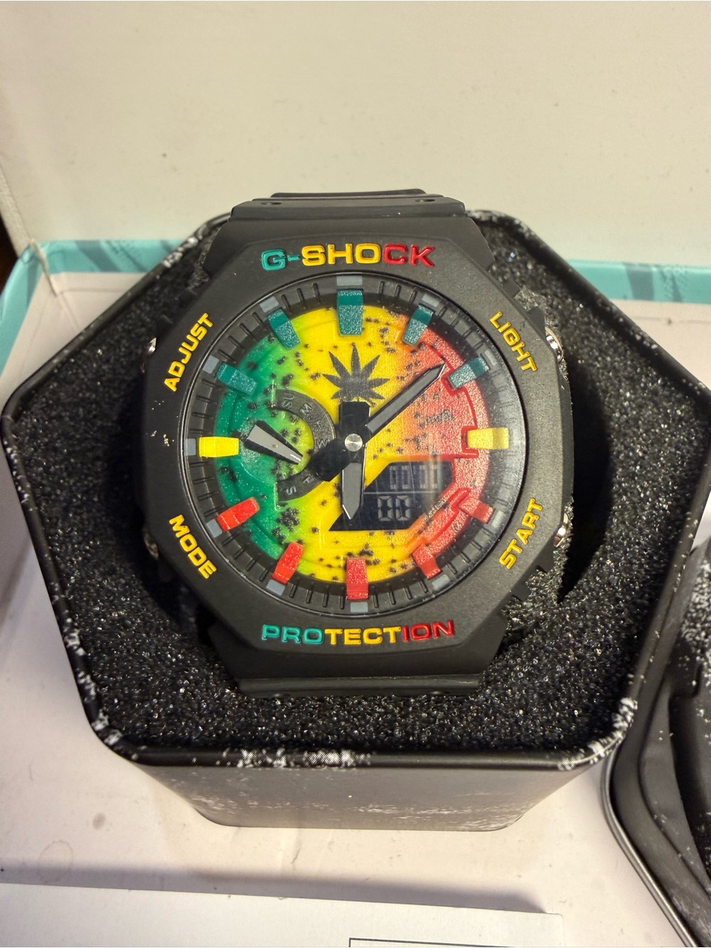 G-Shock Black Watch with Rasta Red, Yellow, Green Dial